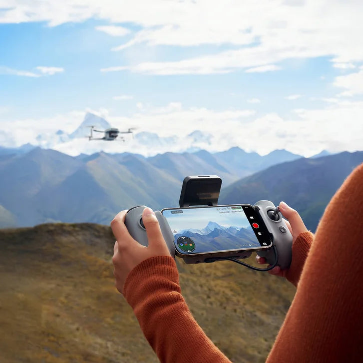 Potensic ATOM 2 4K Drone Bundle with 128GB MicroSD Card, Remote Lanyard and 2 Spare Propeller Kits.